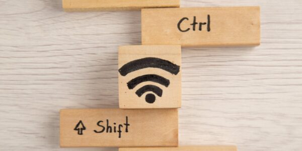 top-view-wifi-shift-caps-lock-ctrl-esc-icons-on-wo-2023-11-27-05-22-43-utc